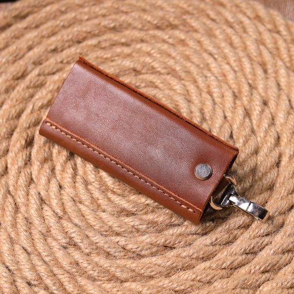 Good quality key holder in glossy leather Ukraine GRANDE PELLE 16722 Light brown 16722 фото