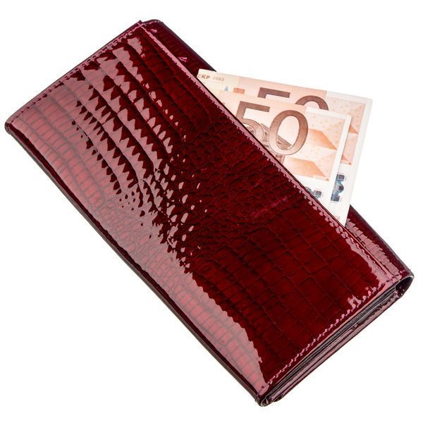 Місткий лаковий жіночий гаманець на кнопці ST Leather 18904 Бордовий 18904 фото